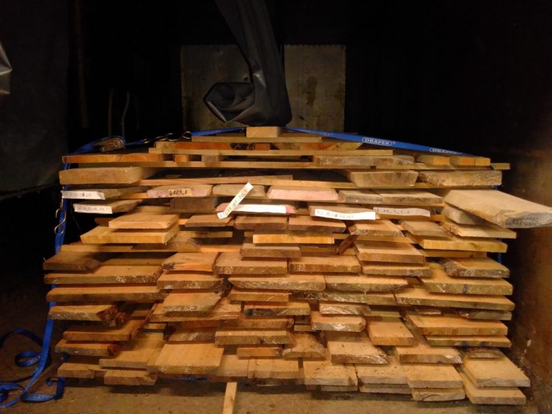 Timber stacked to dry in kiln